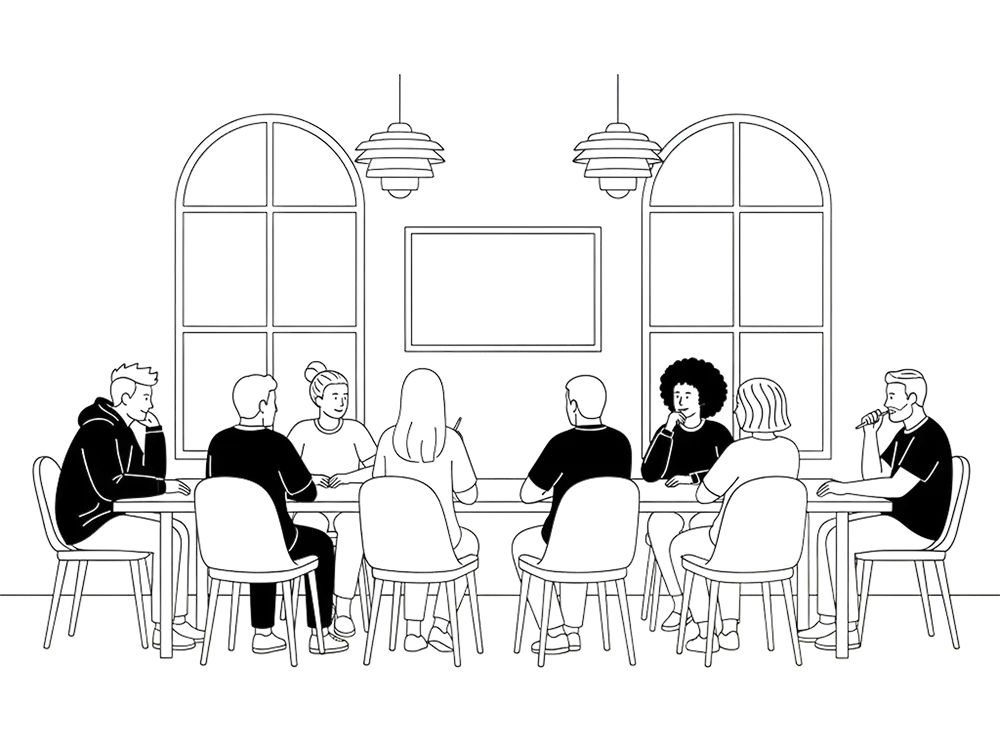 A board meeting in progress around a table